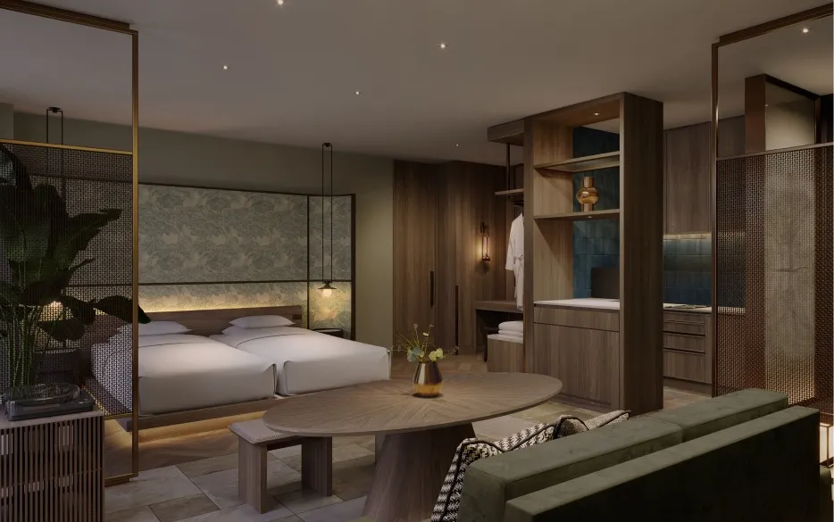 Harmonious deluxe room featuring wood warmth and modern design, with a deep green sofa, oval table, and twin beds behind a lattice partition.