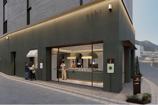 街並みに馴染むモダンな佇まいのnebiスイーツスタンド外観。